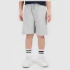 KRÓTKIE spodenki chłopięce 4F dziecięce DRESOWE TSHOM629 oversize 140